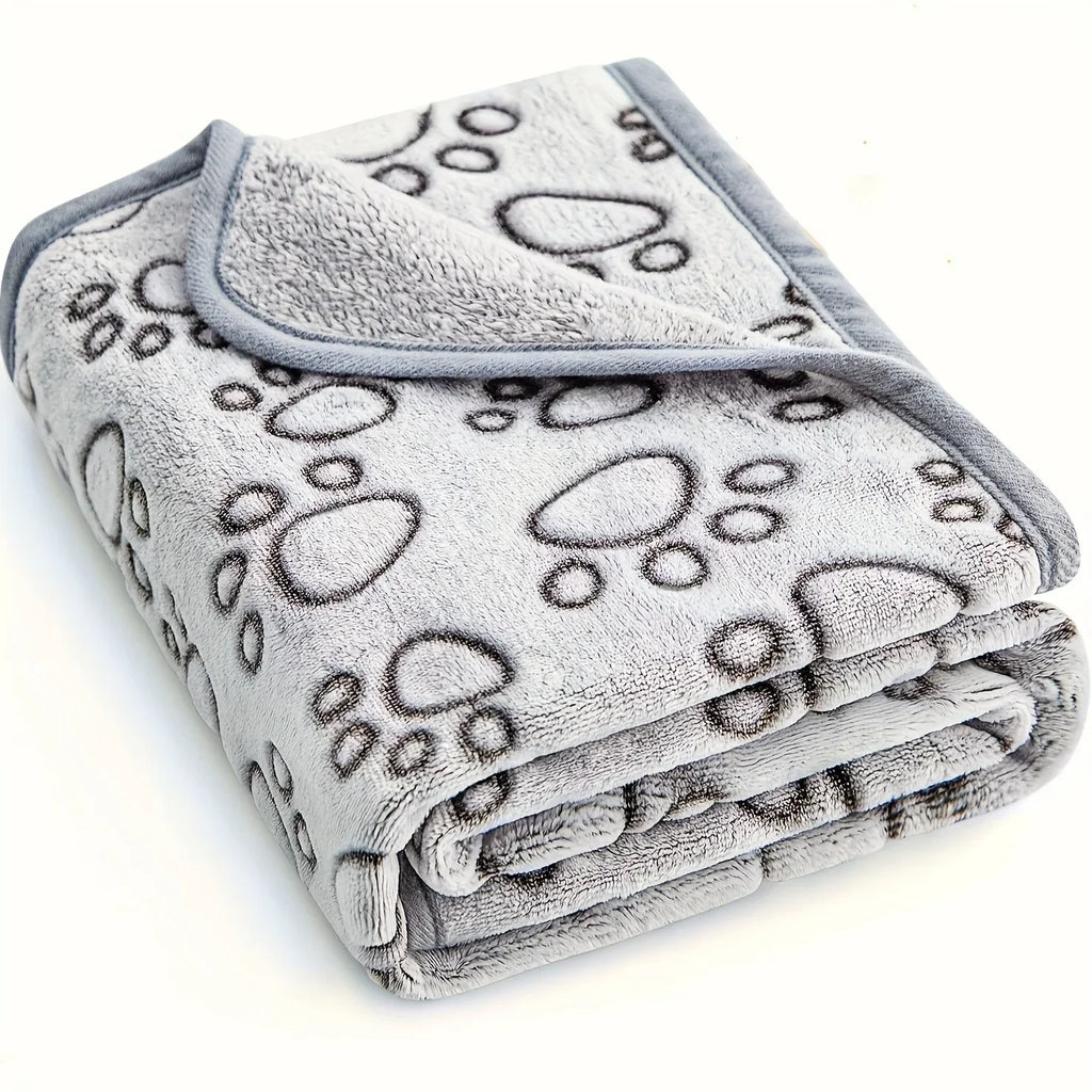 High-quality soft and fluffy pet blanket, cute cartoon pattern, warm and comfortable for dogs or cats.