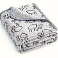 High-quality soft and fluffy pet blanket, cute cartoon pattern, warm and comfortable for dogs or cats.