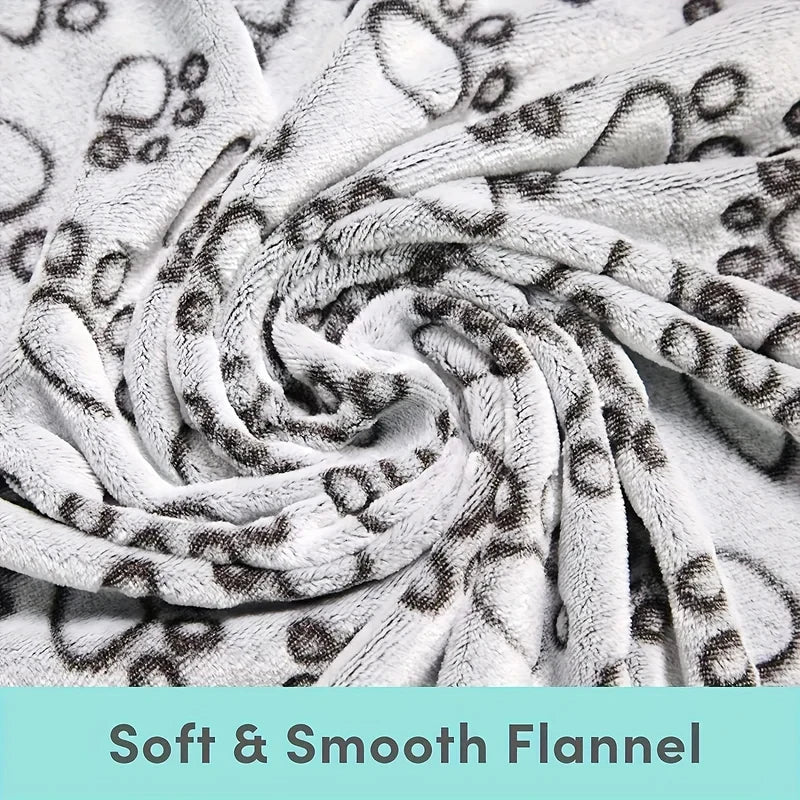 High-quality soft and fluffy pet blanket, cute cartoon pattern, warm and comfortable for dogs or cats.