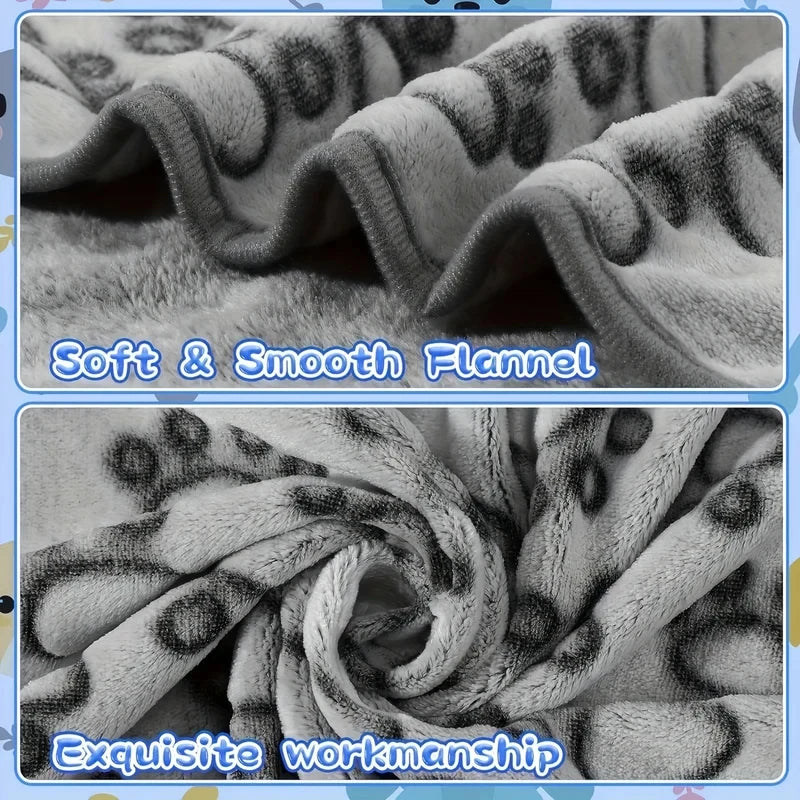High-quality soft and fluffy pet blanket, cute cartoon pattern, warm and comfortable for dogs or cats.